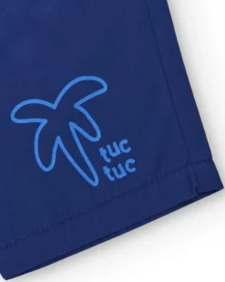 Bermuda para niño en azul con estampado de palmera