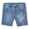 Bermuda vaquera para niño en azul con estampado de palmera