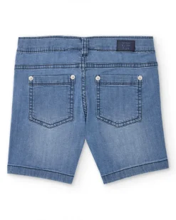 Bermuda vaquera para niño en azul con estampado de palmera