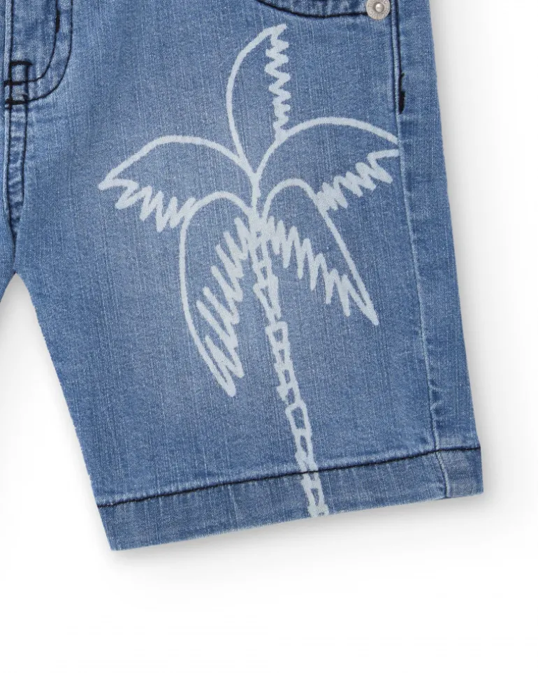Bermuda vaquera para niño en azul con estampado de palmera
