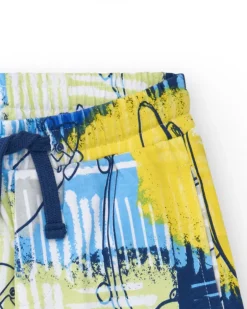 Bermudas pour garçon en bleu avec taille élastique et imprimé multicolore.