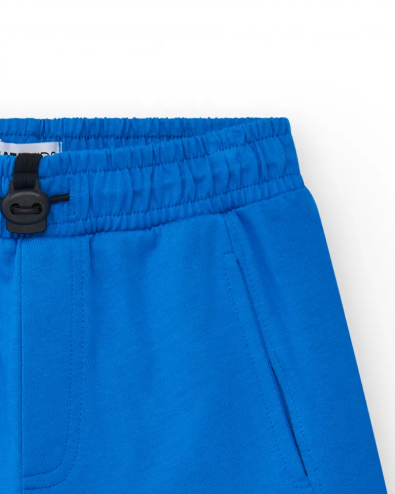 Bermudas pour garçon en bleu avec taille ajustable et poches.