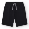 Bermudas pour garçon en noir avec taille ajustable et poches.