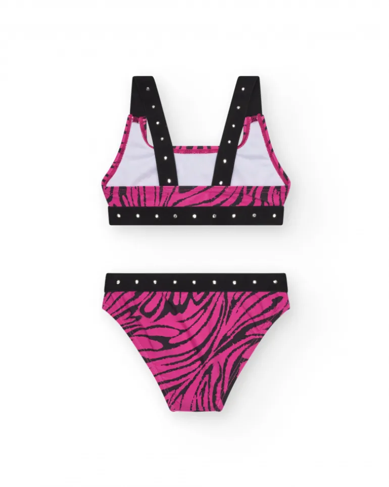 Bikini pour fille en rose avec imprimé animal et clous métalliques.
