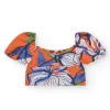 Blouse pour fille en orange avec imprimé floral.