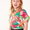 Chemise pour fille avec imprimé tropical et nœud à l’avant.
