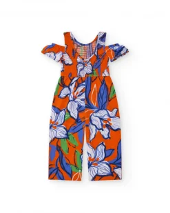 Combinaison longue pour fille en orange avec épaules dénudées.