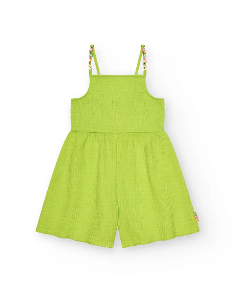 Combinaison pour fille en vert avec bretelles et détails multicolores.