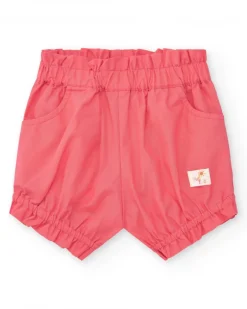 Ensemble blanc et corail pour fille avec t-shirt de feuilles tropicales et shorts froncés