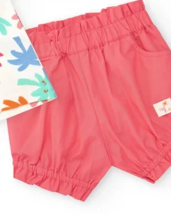 Ensemble blanc et corail pour fille avec t-shirt de feuilles tropicales et shorts froncés