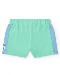 Ensemble pour garçon avec t-shirt blanc à imprimé tropical et shorts verts avec détails bleus