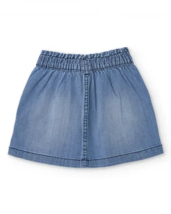 Falda vaquera para niña en azul con estampado de corazón