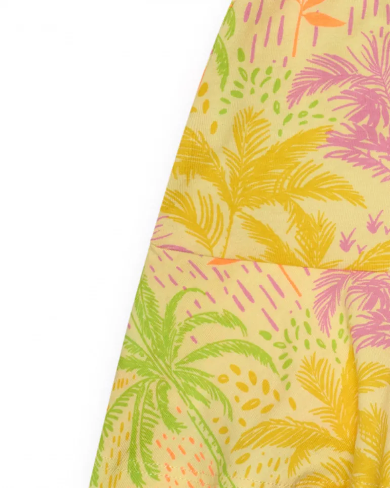 Jupe pour fille en jaune avec imprimé tropical et taille élastique.