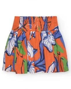 Jupe pour fille en orange avec taille élastique et imprimé floral.