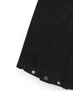 Jupe-short pour fille en noir avec détails métalliques.