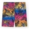 Legging cycliste pour fille avec imprimé tropical et taille élastique.