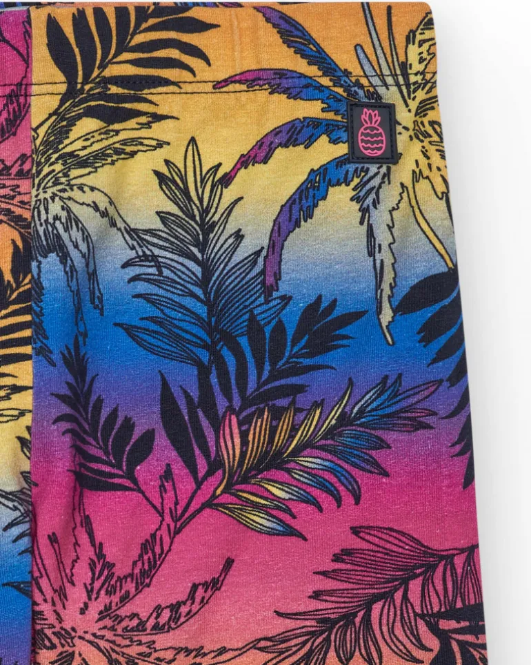 Legging cycliste pour fille avec imprimé tropical et taille élastique.