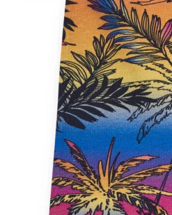 Legging cycliste pour fille avec imprimé tropical et taille élastique.