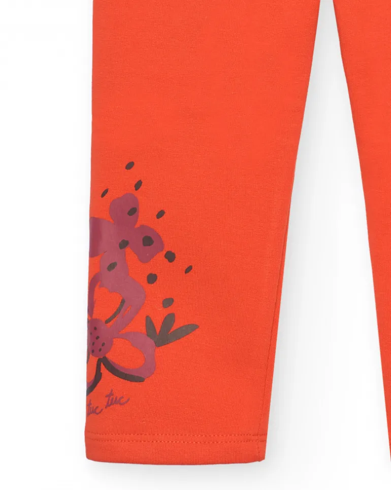 Legging fille orange détail fleuri collection Super Natural