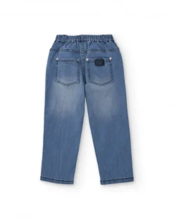 Pantalón vaquero para niño en azul con estampado de palmeras