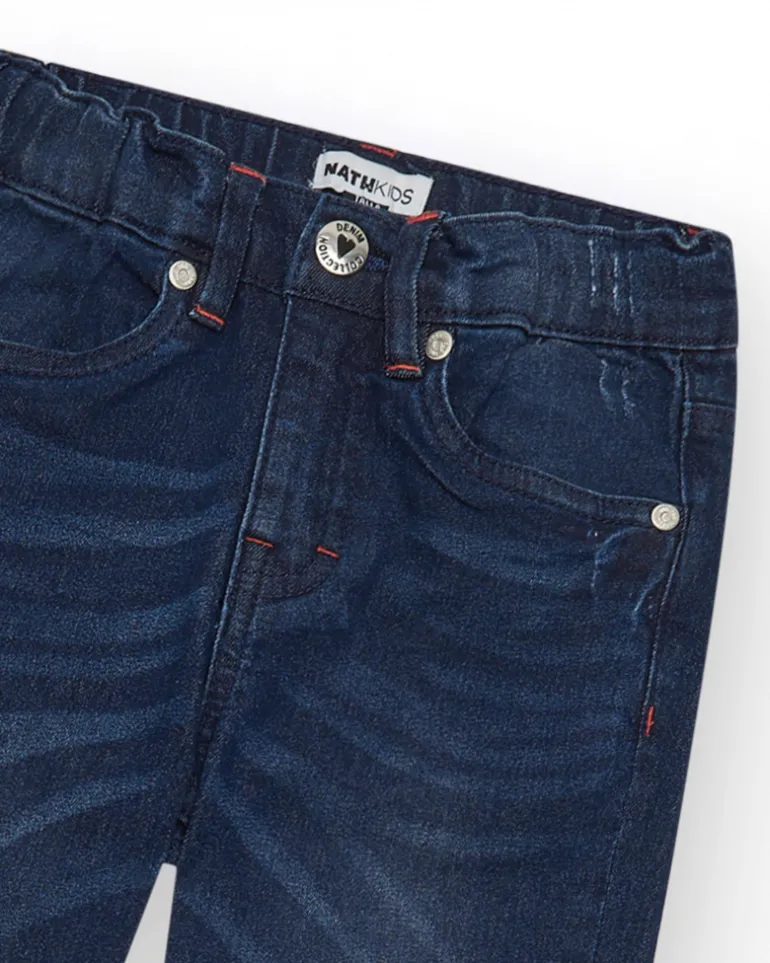 Pantalon en jean bleu foncé pour garçon avec effet usé.