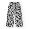 Pantalon pour fille en blanc avec taille élastique et imprimé floral.