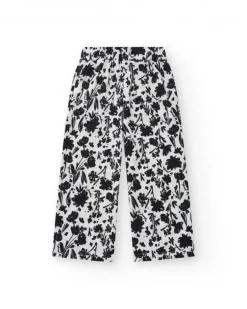 Pantalon pour fille en blanc avec taille élastique et imprimé floral.