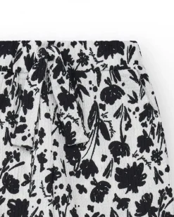Pantalon pour fille en blanc avec taille élastique et imprimé floral.