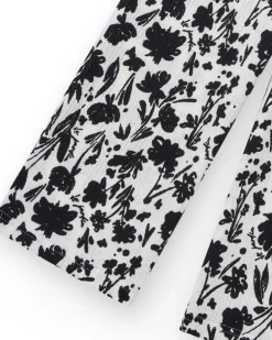Pantalon pour fille en blanc avec taille élastique et imprimé floral.