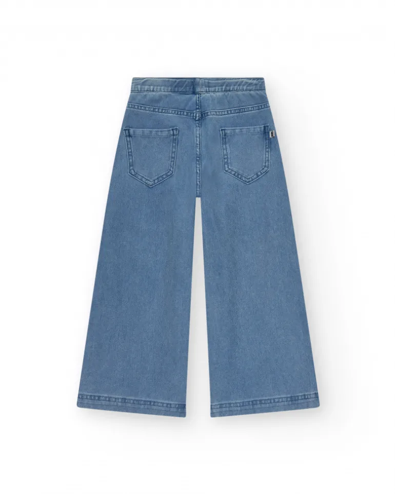 Pantalon pour fille en denim avec fermeture éclair et poches.