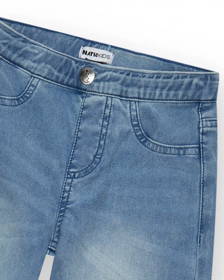 Pantalon pour fille en denim avec fermeture éclair et poches.