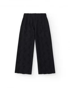 Pantalon pour fille en noir avec taille élastique et broderie.