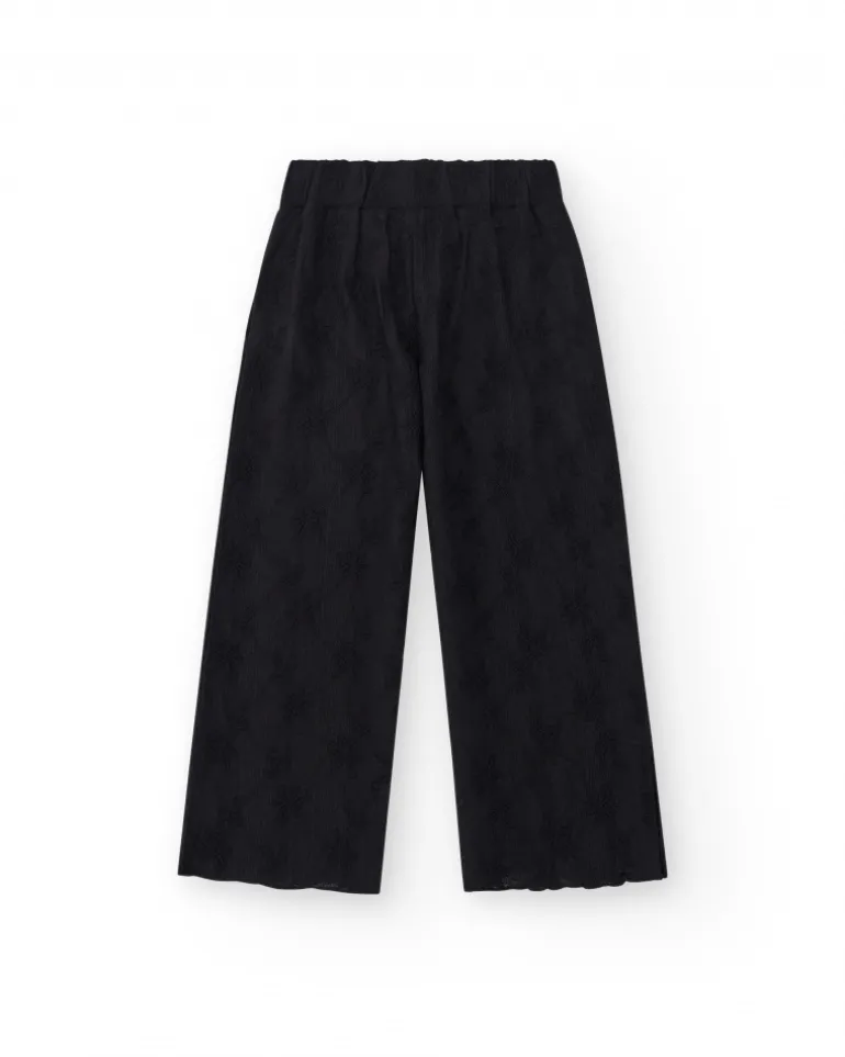 Pantalon pour fille en noir avec taille élastique et broderie.