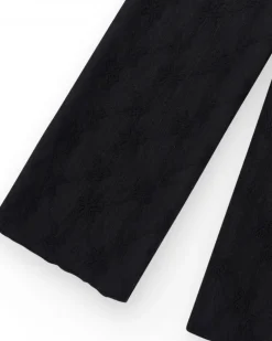 Pantalon pour fille en noir avec taille élastique et broderie.