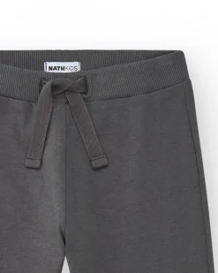 Pantalon pour garçon en gris avec taille élastique et cordon de serrage.