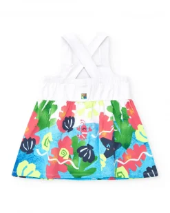 Robe blanche pour fille avec bretelles croisées et jupe fleurie