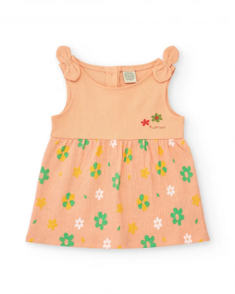 Robe couleur pêche pour fille avec imprimé floral et bretelles nouées