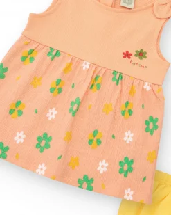 Robe couleur pêche pour fille avec imprimé floral et bretelles nouées