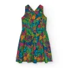 Robe pour fille avec imprimé tropical multicolore et bretelles croisées.