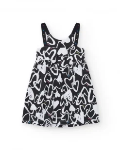 Robe pour fille en noir avec bretelles ajustables et appliques.