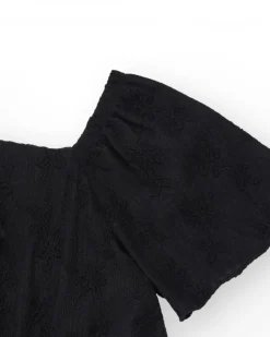 Robe pour fille en noir avec manches courtes bouffantes.