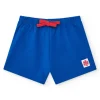 Short bleu pour fille avec taille élastique et nœud rouge
