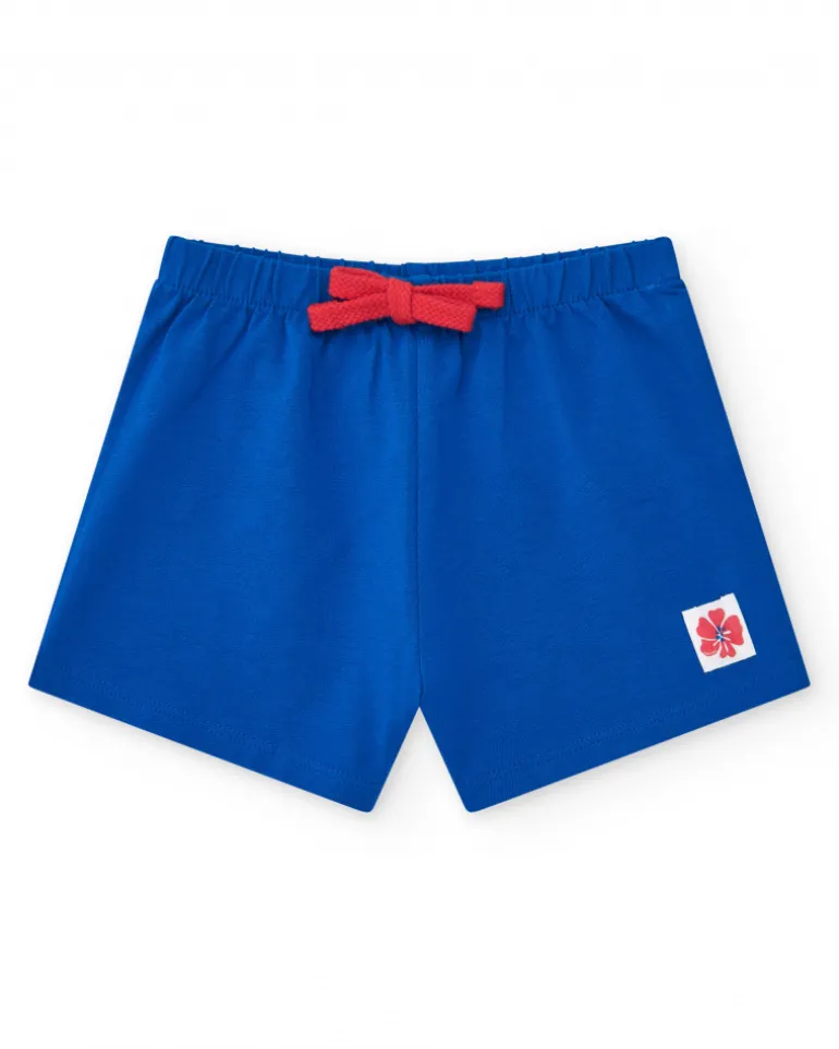 Short bleu pour fille avec taille élastique et nœud rouge