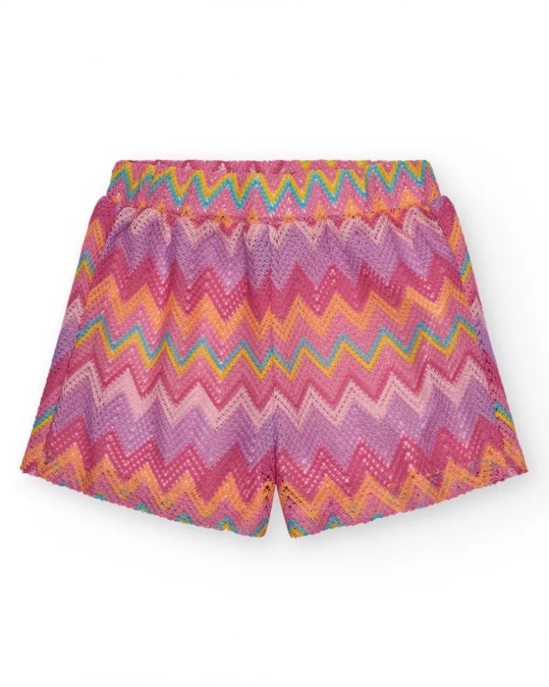 Short multicolore pour fille avec imprimé et taille élastique.