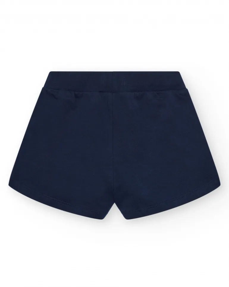 Short pour fille en bleu avec taille élastique et poches.