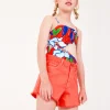 Short pour fille en denim corail avec poches latérales.