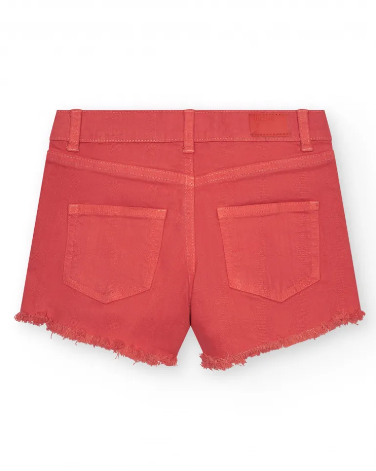 Short pour fille en denim corail avec poches latérales.