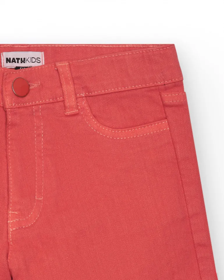 Short pour fille en denim corail avec poches latérales.
