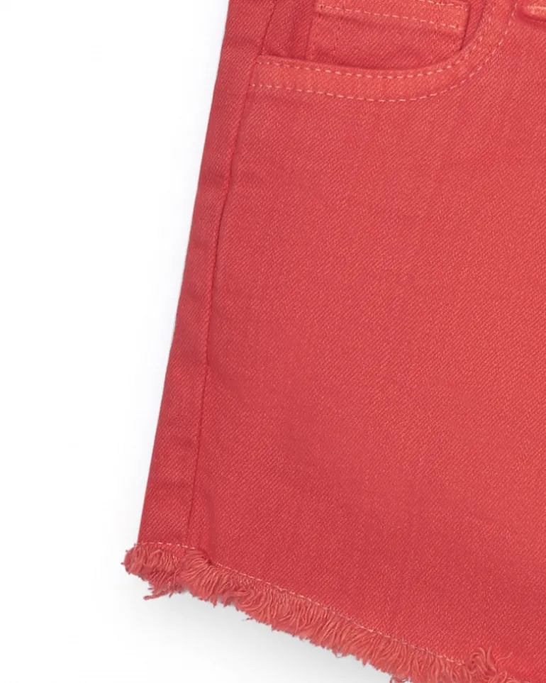 Short pour fille en denim corail avec poches latérales.