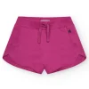 Short pour fille en fuchsia avec taille élastique et poches.